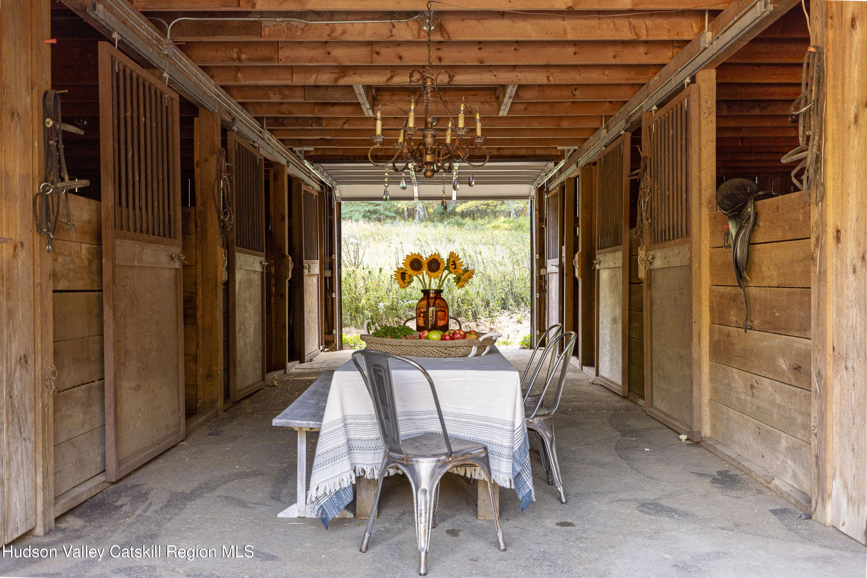 119 Mt Laurel Road Kerhonkson, NY 12446 - Photo 34 of 37 a view of a dining room with furniture chandelier and entryway