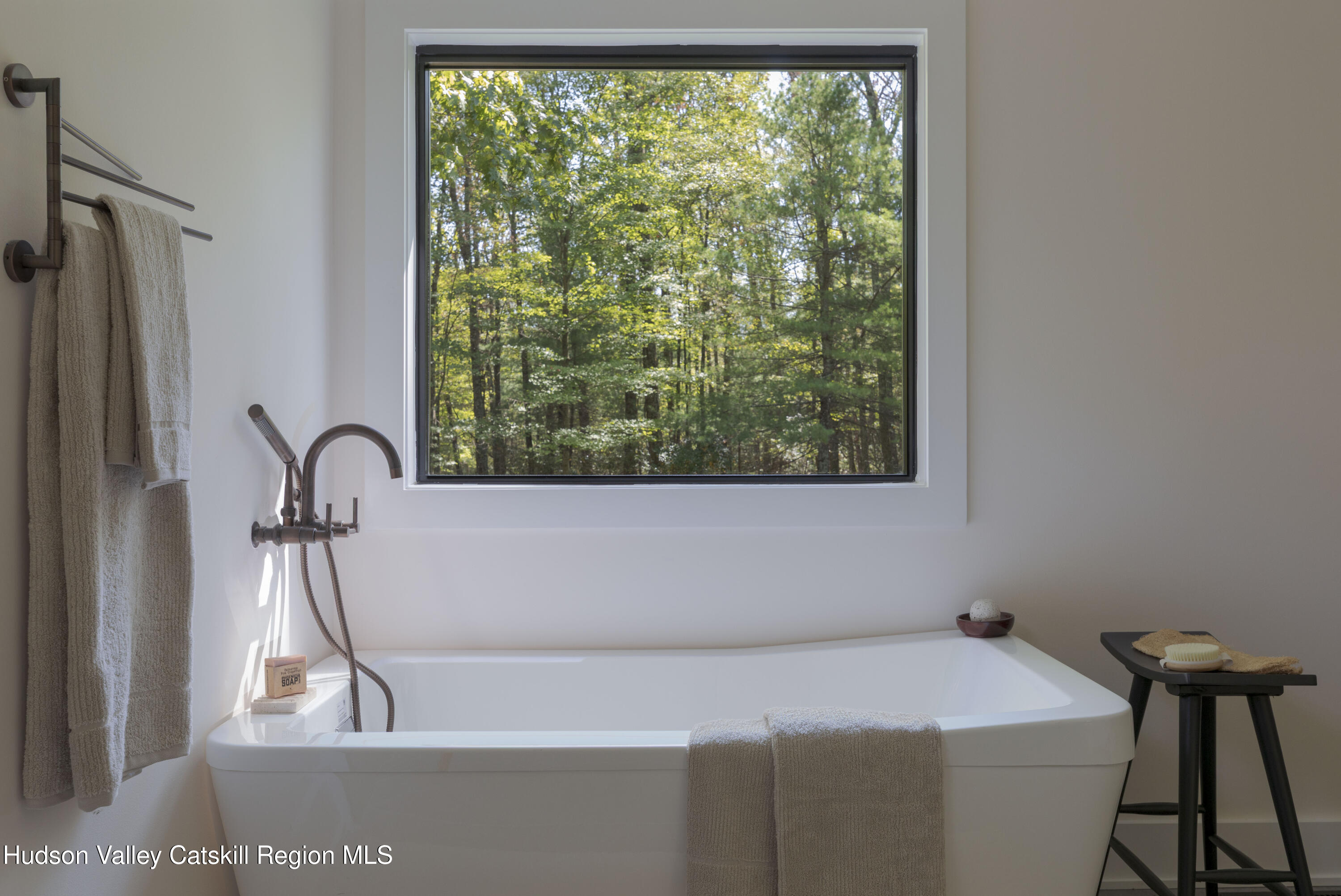 119 Mt Laurel Road Kerhonkson, NY 12446 - Photo 5 of 37 a bathroom with a bathtub and a window