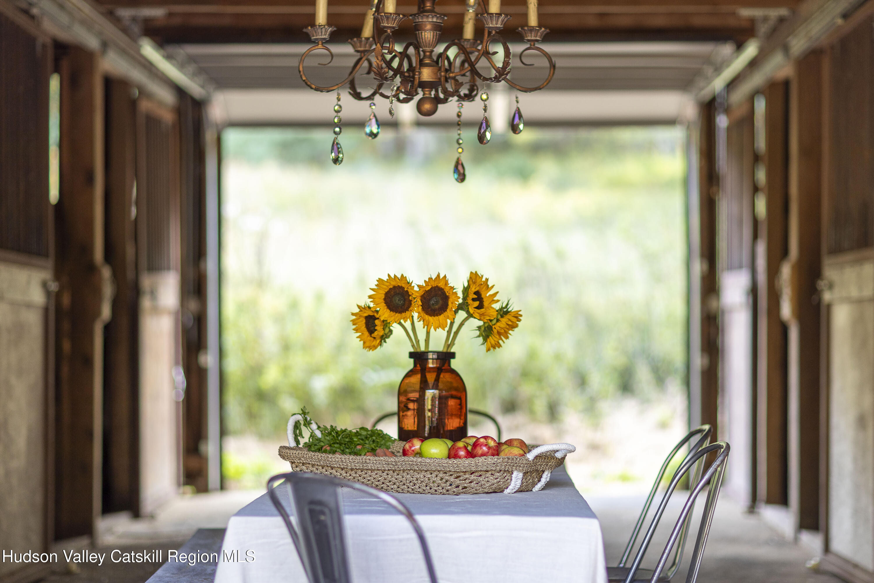 119 Mt Laurel Road Kerhonkson, NY 12446 - Photo 8 of 37 a view of a dining room with furniture a chandelier and window