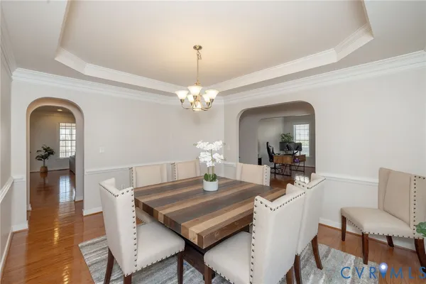 a bathroom with a sink a toilet and shower curtain
