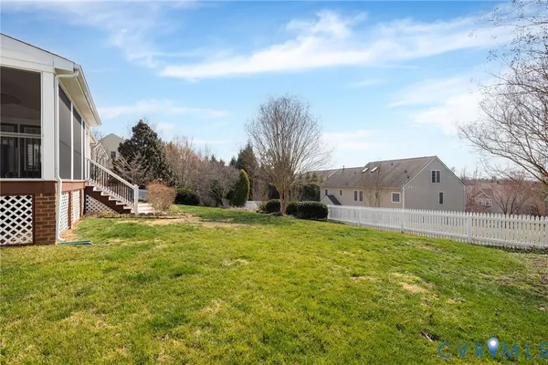 a view of entryway and hall with dining room