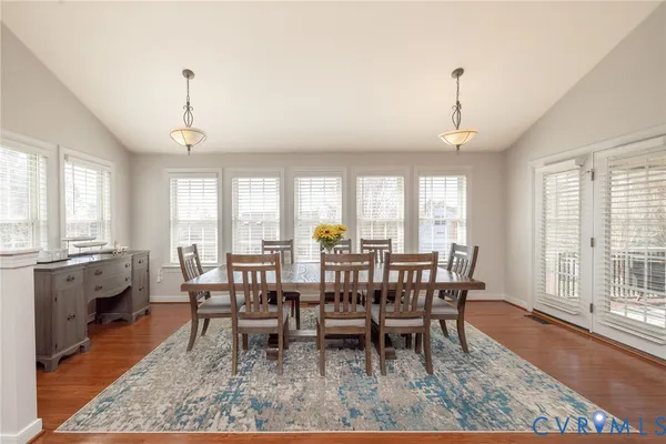 a view of a dining room with furniture
