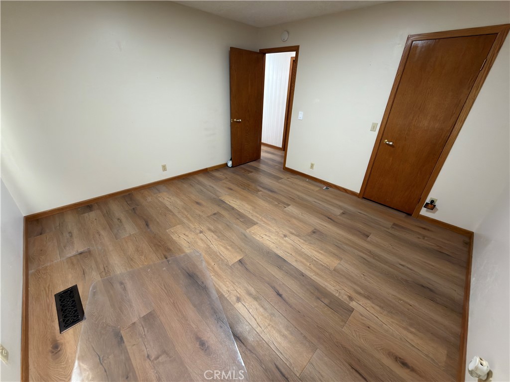 4 Rockridge Road Oroville, CA 95966 - Photo 13 of 18 a view of an empty room with wooden floor
