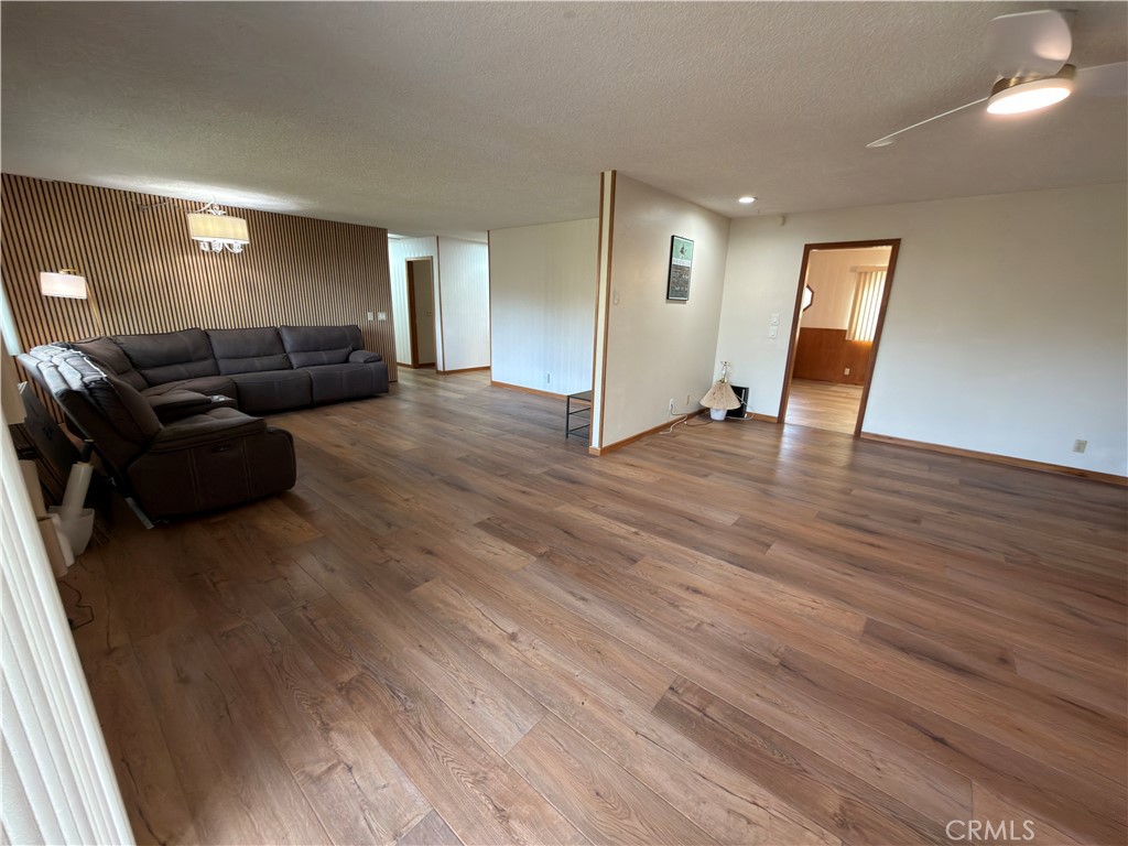 4 Rockridge Road Oroville, CA 95966 - Photo 15 of 18 a living room with furniture and a wooden floor