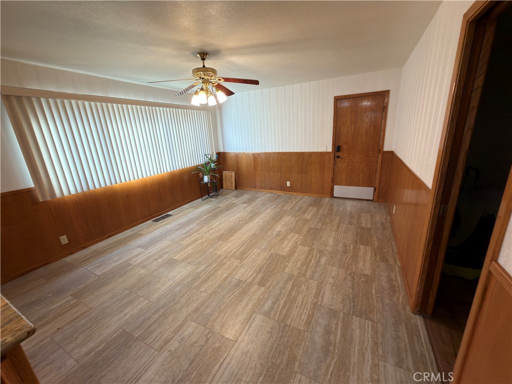 4 Rockridge Road Oroville, CA 95966 - Photo 4 of 18 wooden floor in an empty room with a window