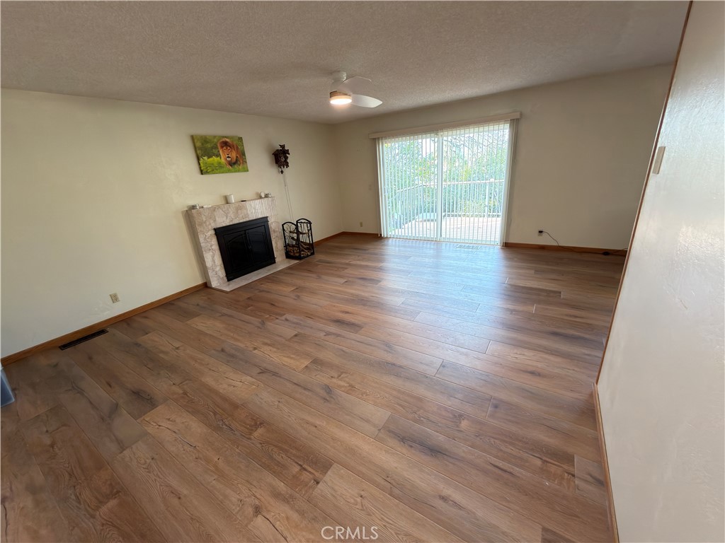 4 Rockridge Road Oroville, CA 95966 - Photo 7 of 18 a view of empty room with wooden floor and fan