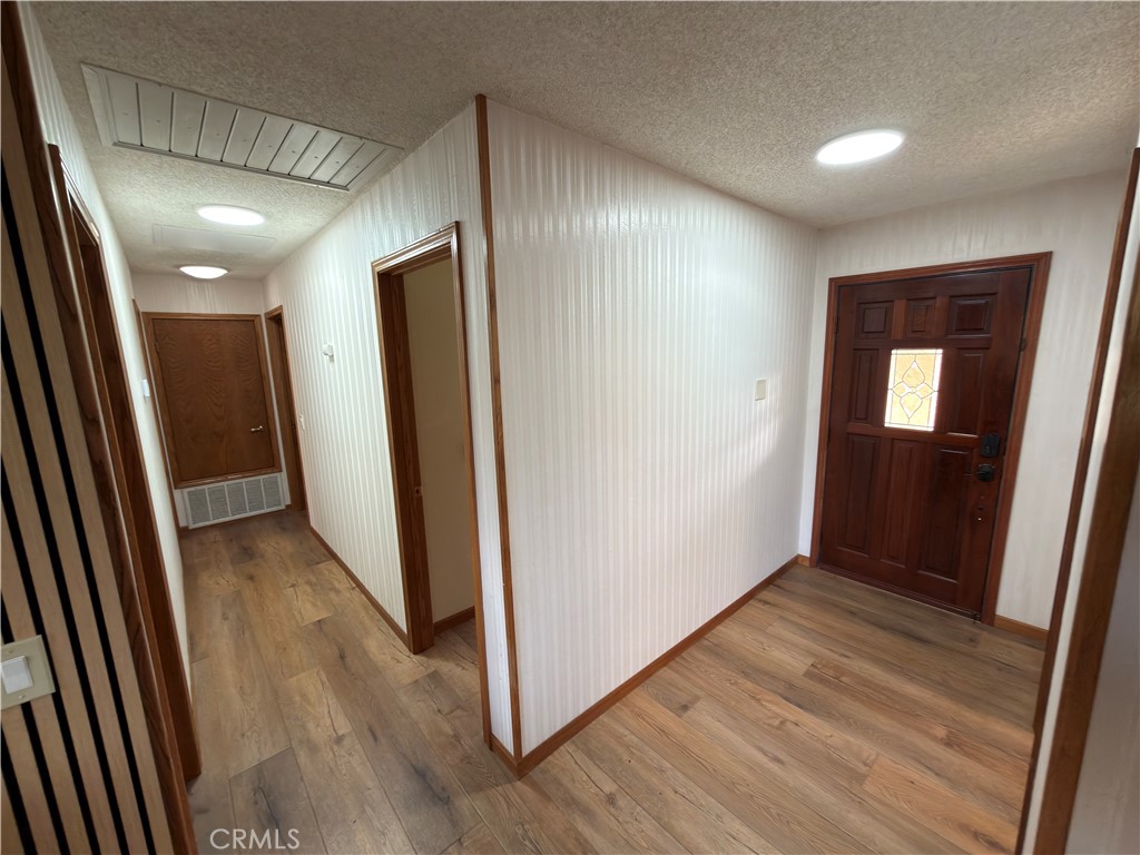 4 Rockridge Road Oroville, CA 95966 - Photo 8 of 18 a view of hallway with wooden floor