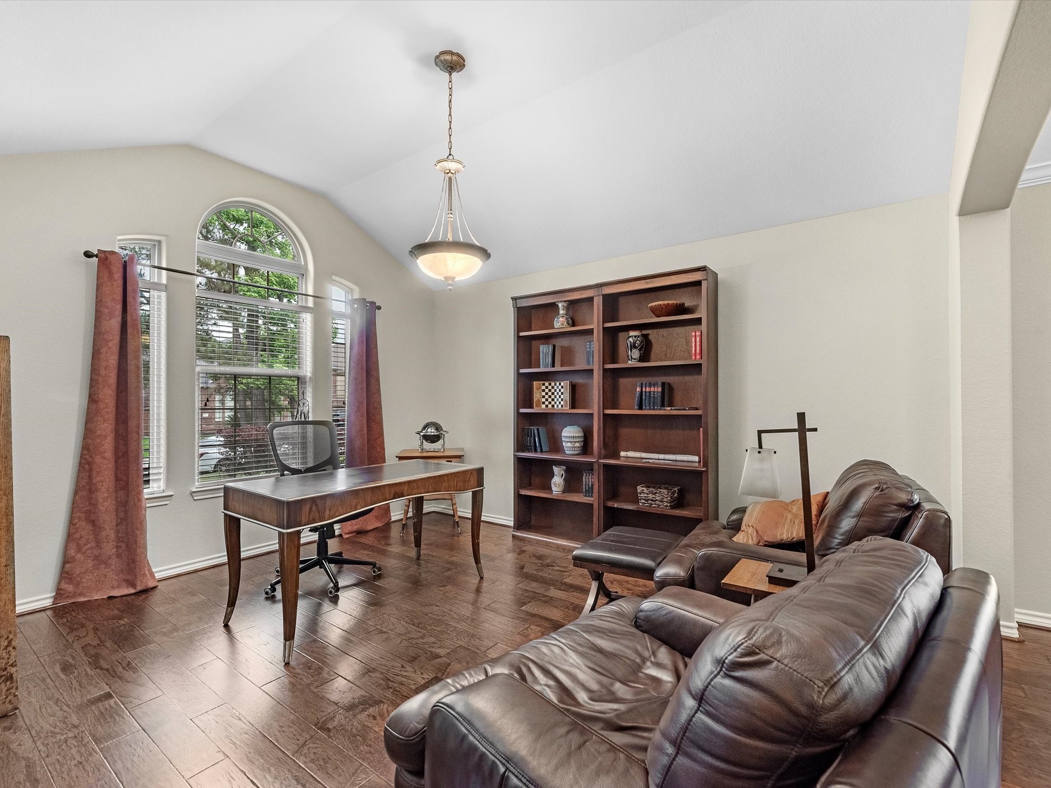 19019 Relay Road Humble, TX 77346 - Photo 5 of 31 a living room with furniture a window and bookshelf