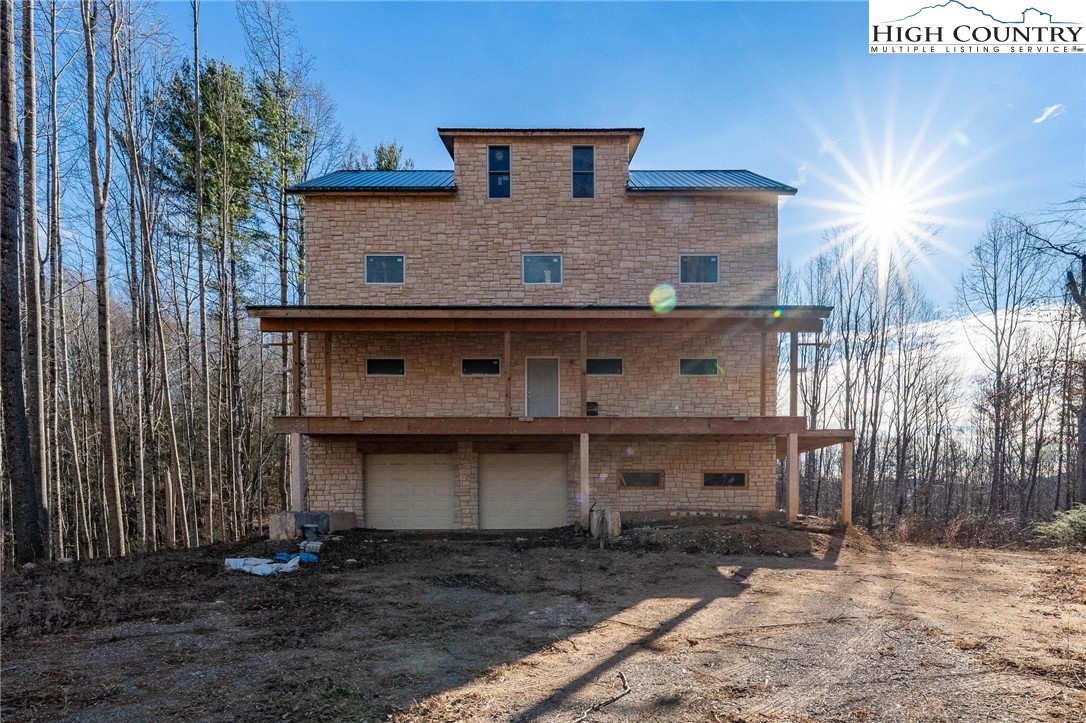 324 Allen Snyder Road Trade, TN 37691 - Photo 14 of 37 a front view of a house with a yard