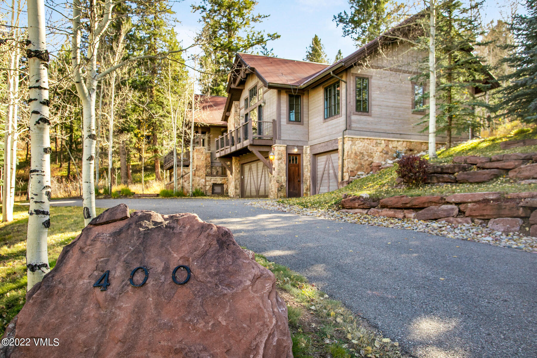 400 Red Draw Edwards, CO 81632 - Photo 2 of 49 a front view of a house with a yard