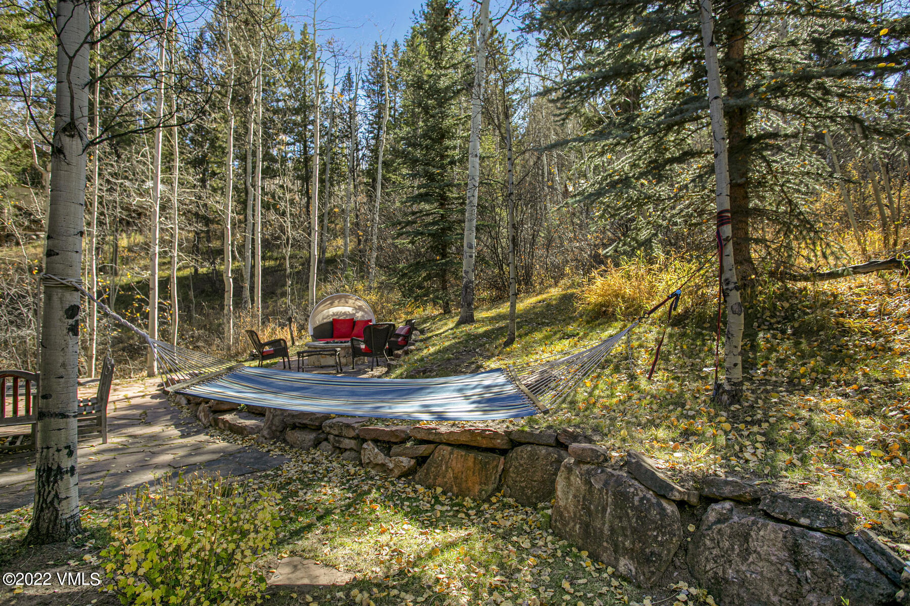 400 Red Draw Edwards, CO 81632 - Photo 25 of 49 a backyard of a house with table and chairs