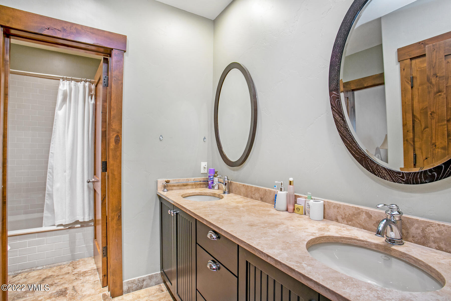 400 Red Draw Edwards, CO 81632 - Photo 35 of 49 a bathroom with a granite countertop double vanity sink and a mirror