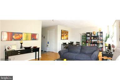 1800 R Street Northwest, Unit 604 Washington, DC 20009 - Photo 2 of 17 Spacious living area with vibrant decor.