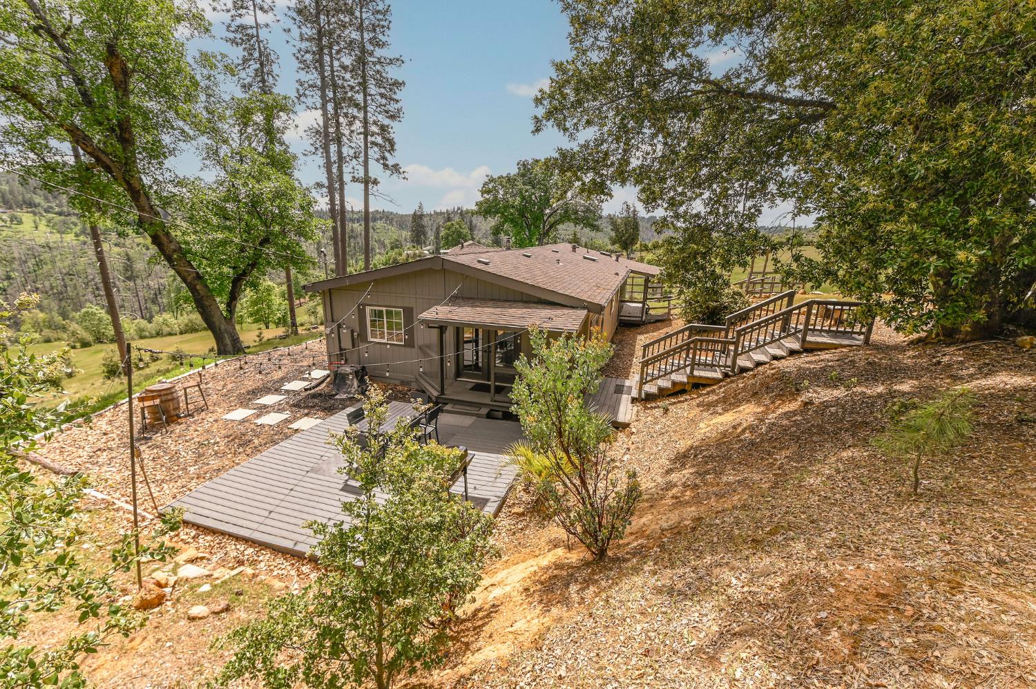 5695 Old Emigrant Trail Mountain Ranch, CA 95246 - Photo 2 of 79 a view of a house with a yard