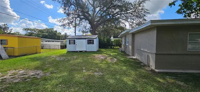 a view of a backyard with a garden