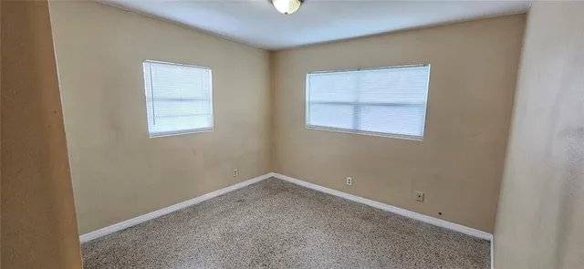 an empty room with a window