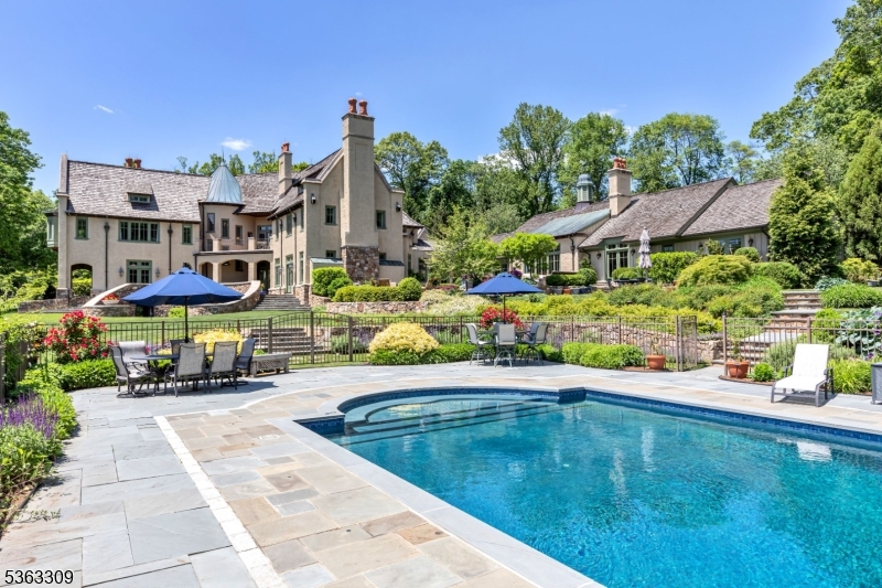 211 Private Road Bernardsville, NJ 07924 - Photo 3 of 50 a swimming pool view with a seating space and a garden view