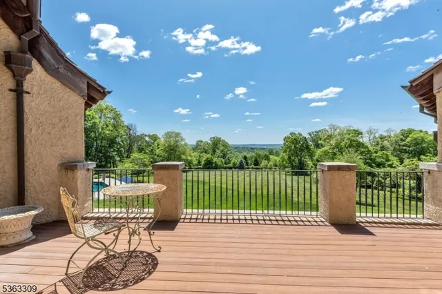 a view of a chairs and tables in the terrace