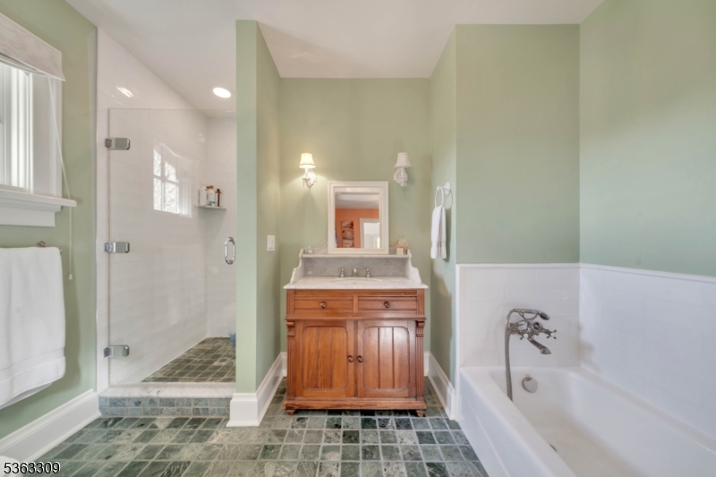 211 Private Road Bernardsville, NJ 07924 - Photo 37 of 50 a bathroom with a bathtub and a shower