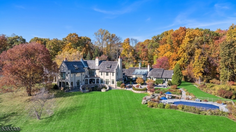 211 Private Road Bernardsville, NJ 07924 - Photo 40 of 50 a backyard of a house with lots of green space and outdoor seating