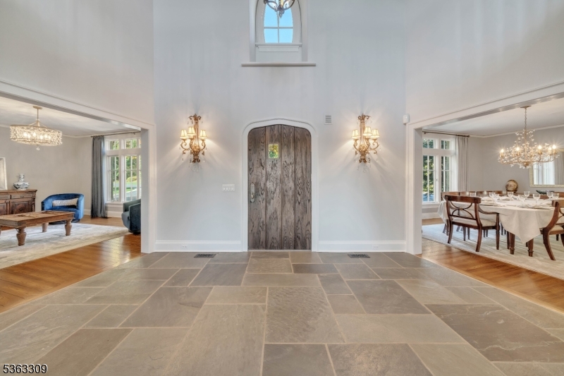 211 Private Road Bernardsville, NJ 07924 - Photo 5 of 50 a view of a livingroom with furniture and a dining room