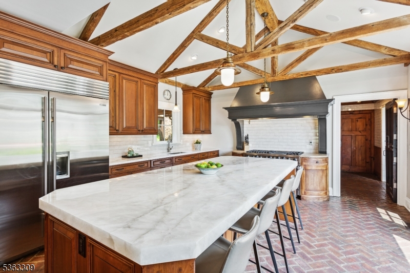 211 Private Road Bernardsville, NJ 07924 - Photo 9 of 50 a kitchen with a table and chairs in it