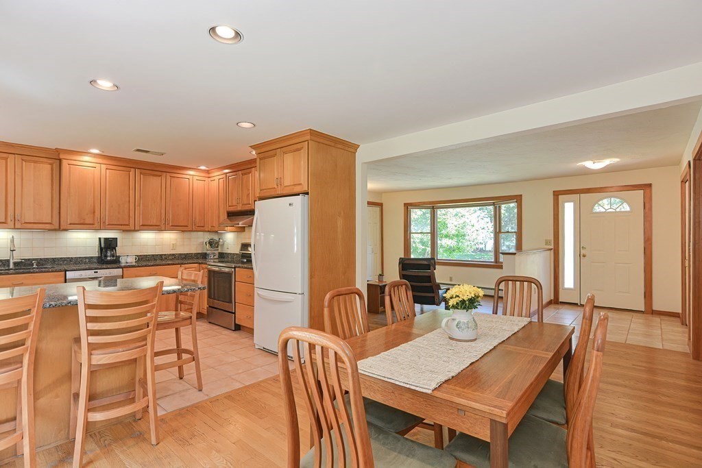 110 Richard Road Holliston, MA 01746 - Photo 12 of 41 a view of a dining room with furniture window and wooden floor