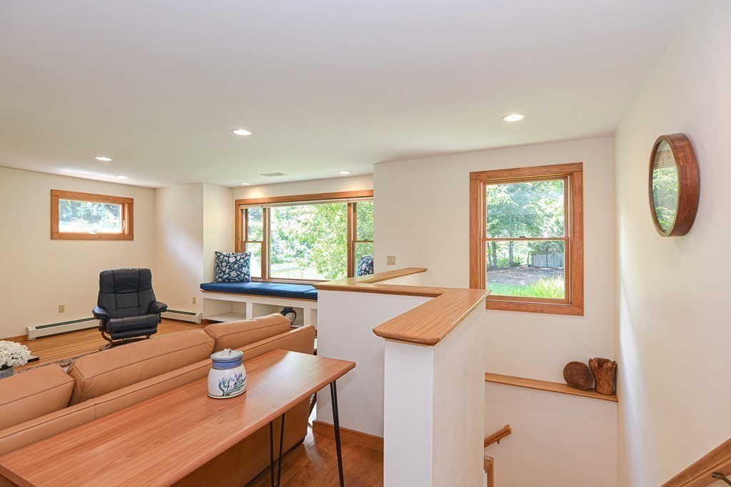 110 Richard Road Holliston, MA 01746 - Photo 22 of 41 a workspace with furniture hardwood and a window