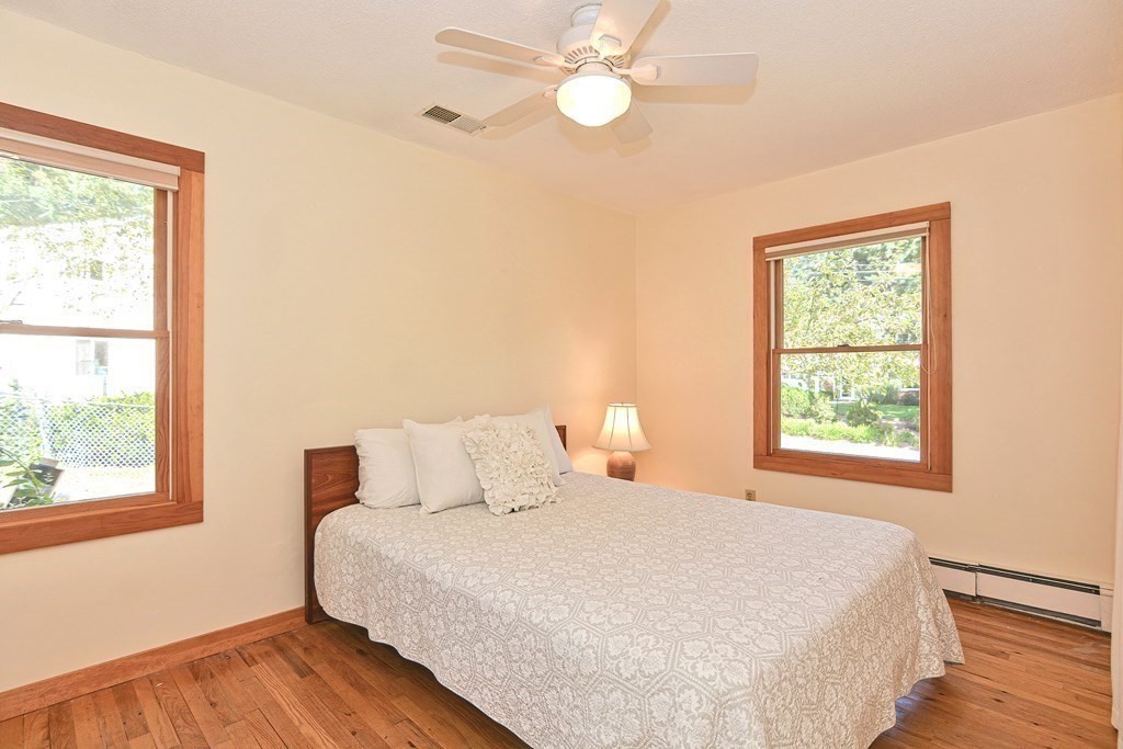 110 Richard Road Holliston, MA 01746 - Photo 33 of 41 a bedroom with a large bed and a window