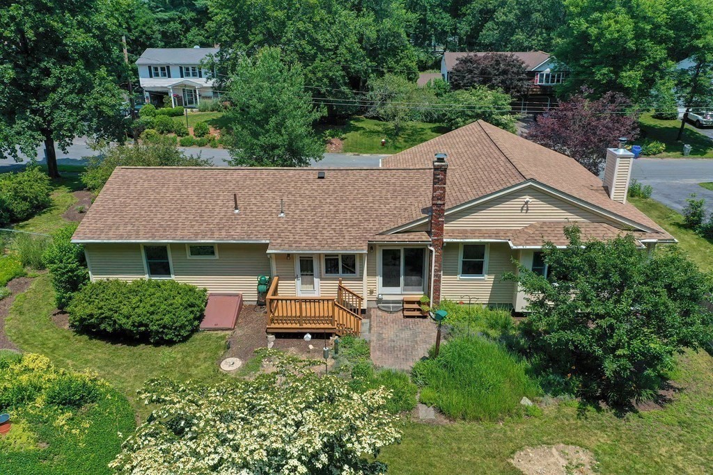 110 Richard Road Holliston, MA 01746 - Photo 40 of 41 a front view of a house with garden