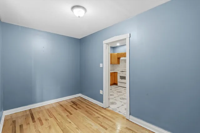 a bedroom with a bed and a table