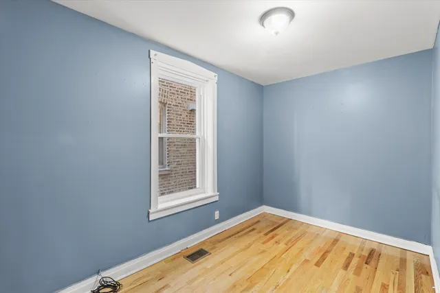 a view of a bedroom with a window