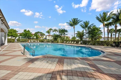 a view of swimming pool with a yard