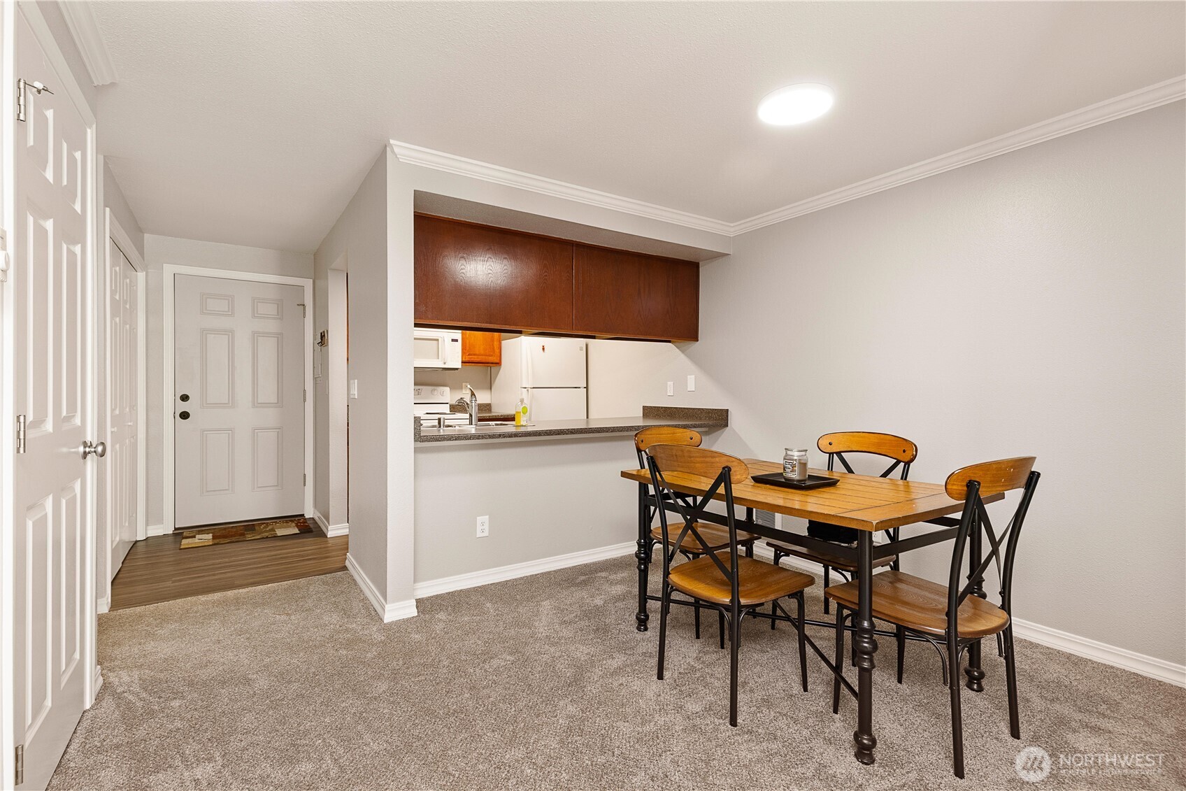 13007 East Gibson Road, Unit U238 Everett, WA 98204 - Photo 12 of 29 a dining room with furniture and window