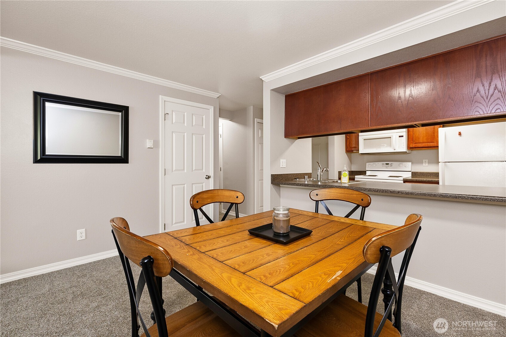 13007 East Gibson Road, Unit U238 Everett, WA 98204 - Photo 16 of 29 a view of a dining area with furniture and a large window