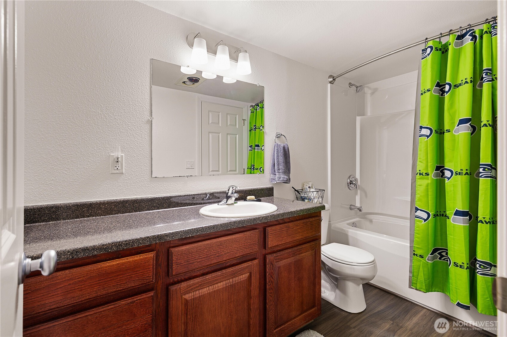 13007 East Gibson Road, Unit U238 Everett, WA 98204 - Photo 25 of 29 a bathroom with a sink a toilet and shower