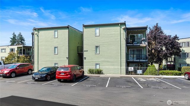 a car parked in front of a house