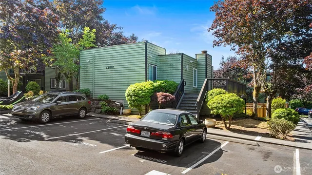 a car parked in front of a house