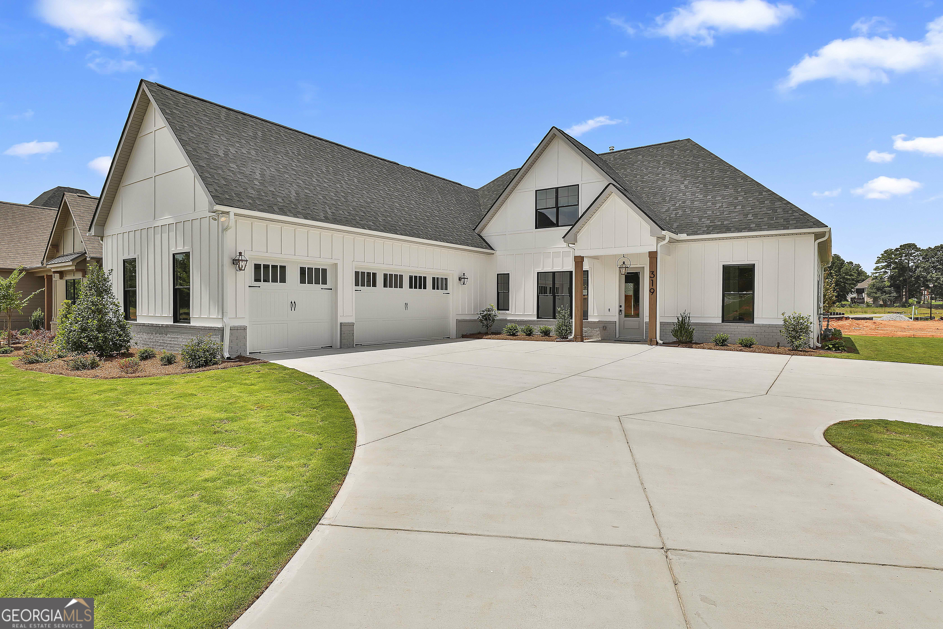 319 Ruffian Circle, Unit 71 Peachtree City, GA 30269 - Photo 3 of 43 a view of house with yard and entertaining space