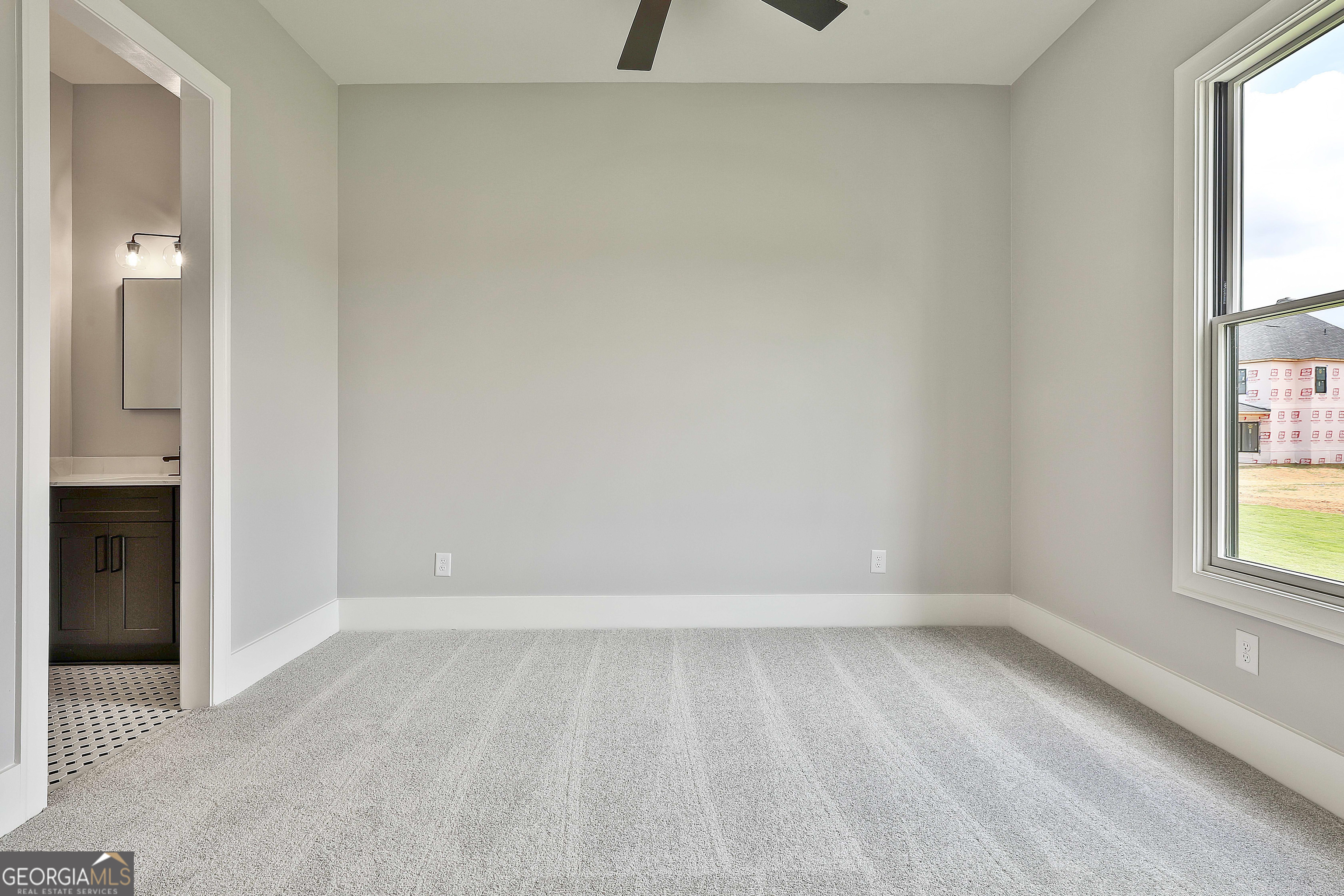 319 Ruffian Circle, Unit 71 Peachtree City, GA 30269 - Photo 31 of 43 an empty room with windows