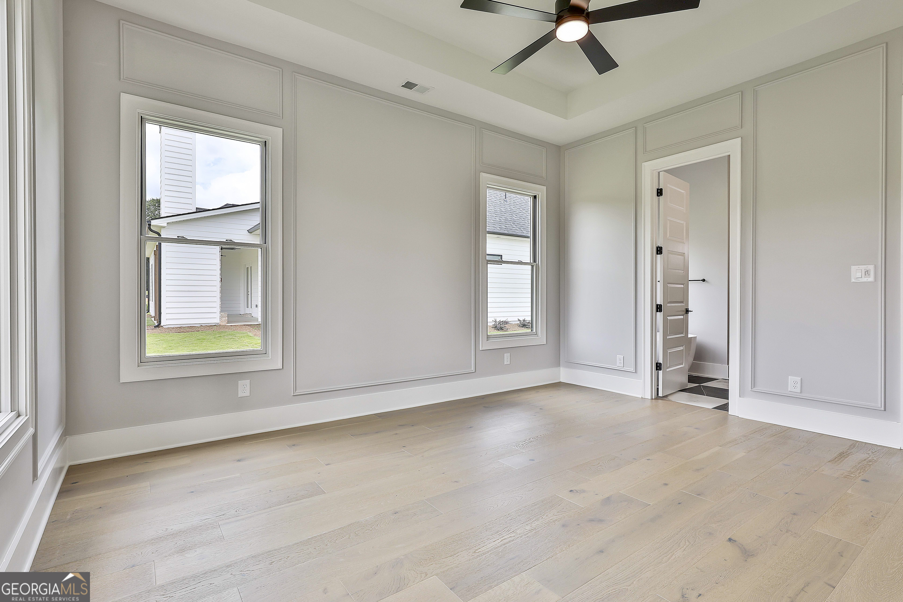 319 Ruffian Circle, Unit 71 Peachtree City, GA 30269 - Photo 34 of 43 a view of an empty room with a window