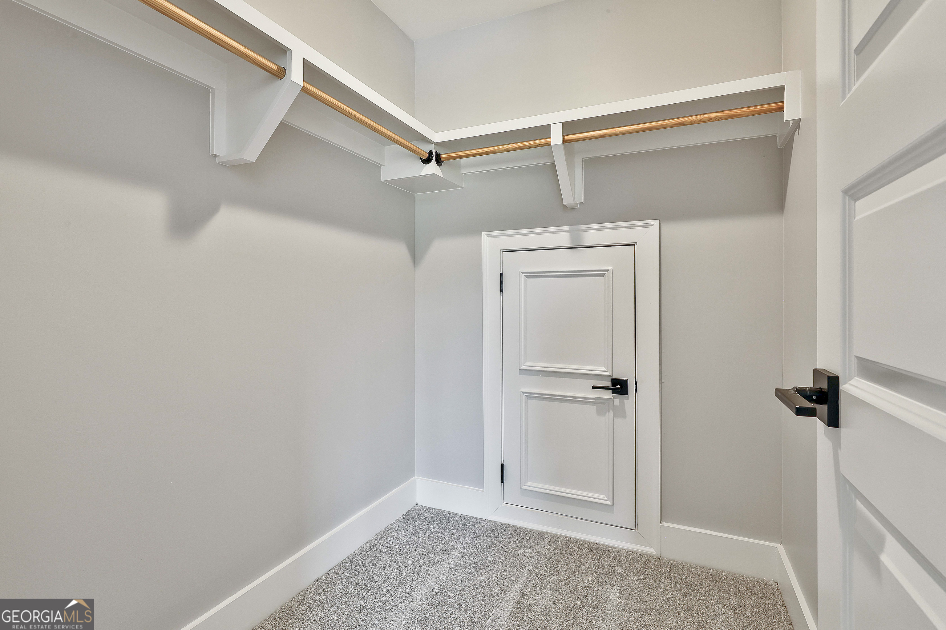 319 Ruffian Circle, Unit 71 Peachtree City, GA 30269 - Photo 39 of 43 a view of an empty walk in closet