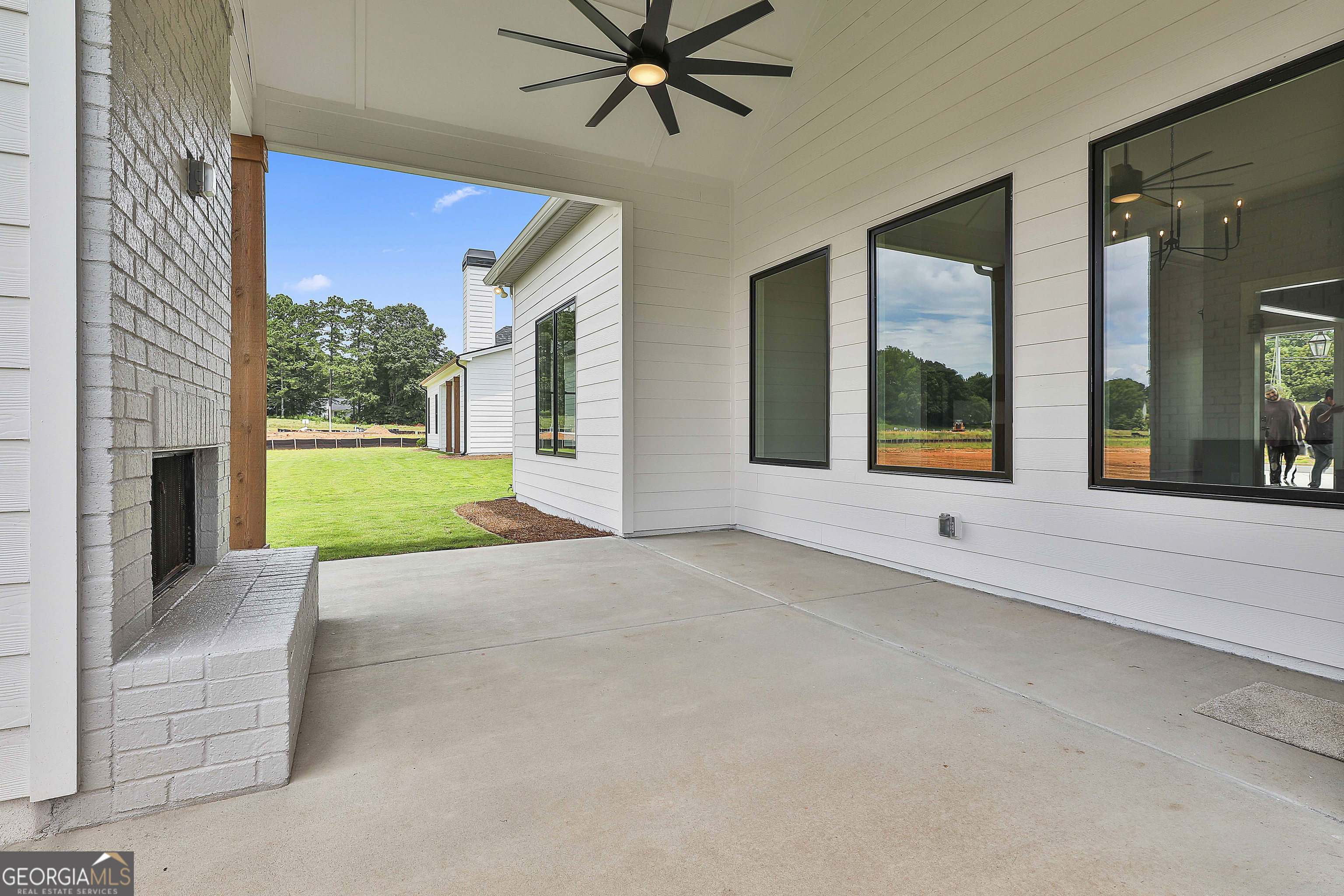 319 Ruffian Circle, Unit 71 Peachtree City, GA 30269 - Photo 41 of 43 a view of a house with a swimming pool