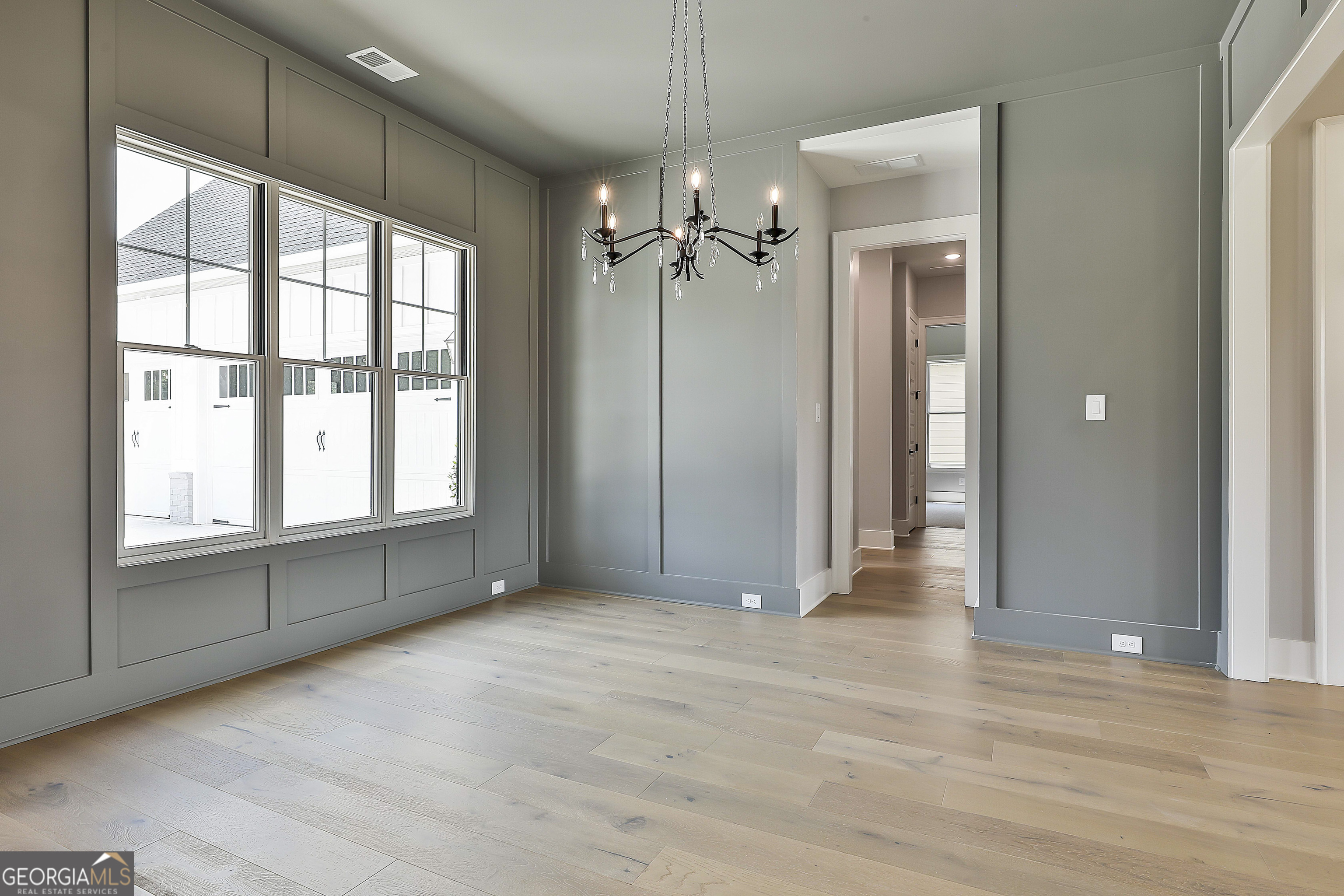 319 Ruffian Circle, Unit 71 Peachtree City, GA 30269 - Photo 8 of 43 a view of an empty room with a window