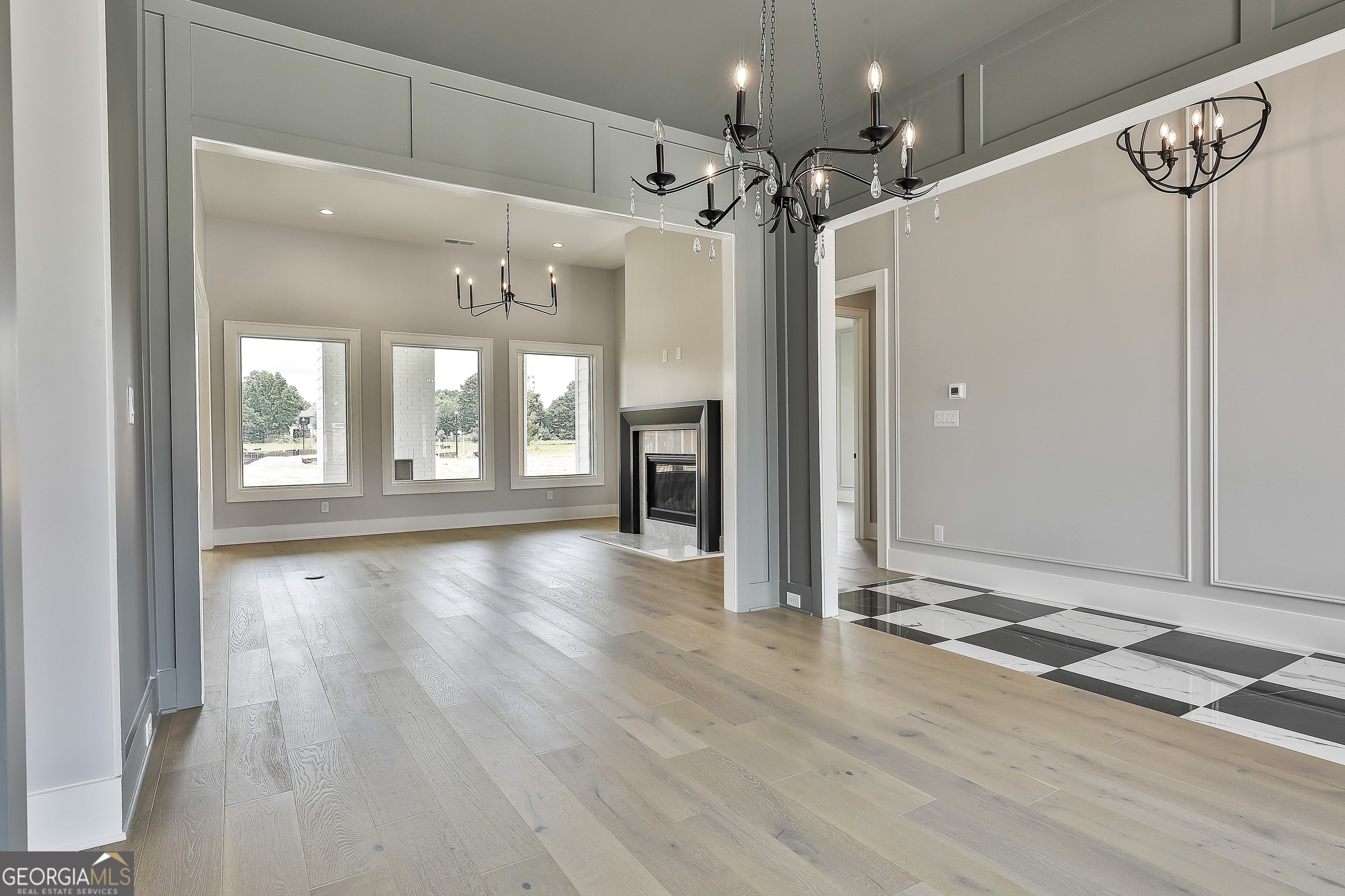 319 Ruffian Circle, Unit 71 Peachtree City, GA 30269 - Photo 10 of 43 a view of a room with wooden floor and a window