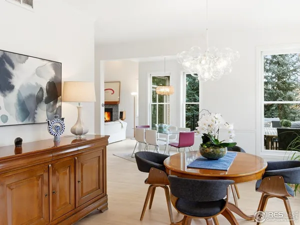 a table room with furniture and a chandelier