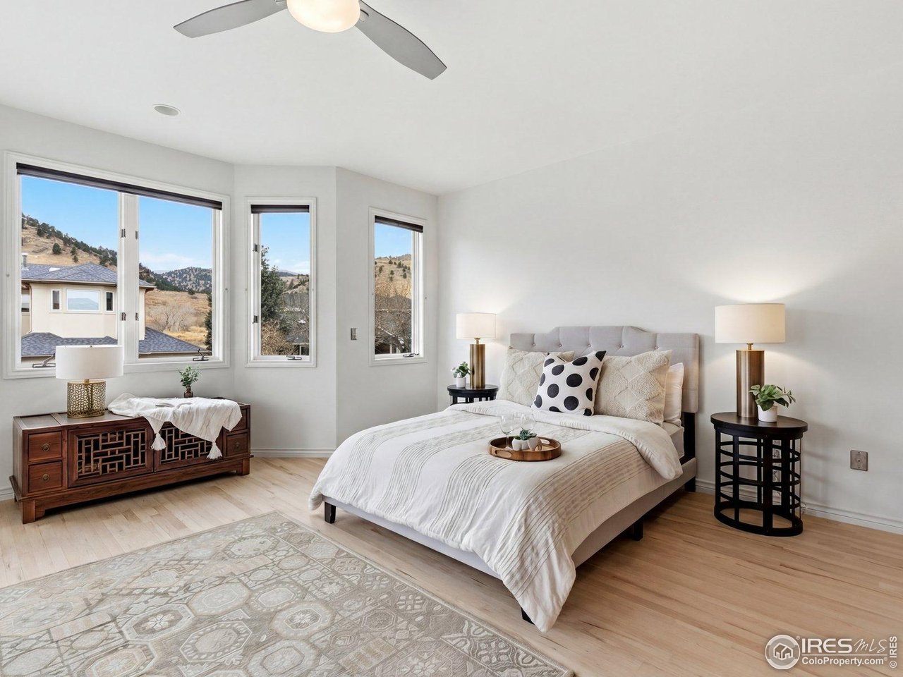 4796 6th Street Boulder, CO 80304 - Photo 23 of 47 a bedroom with a bed and a window