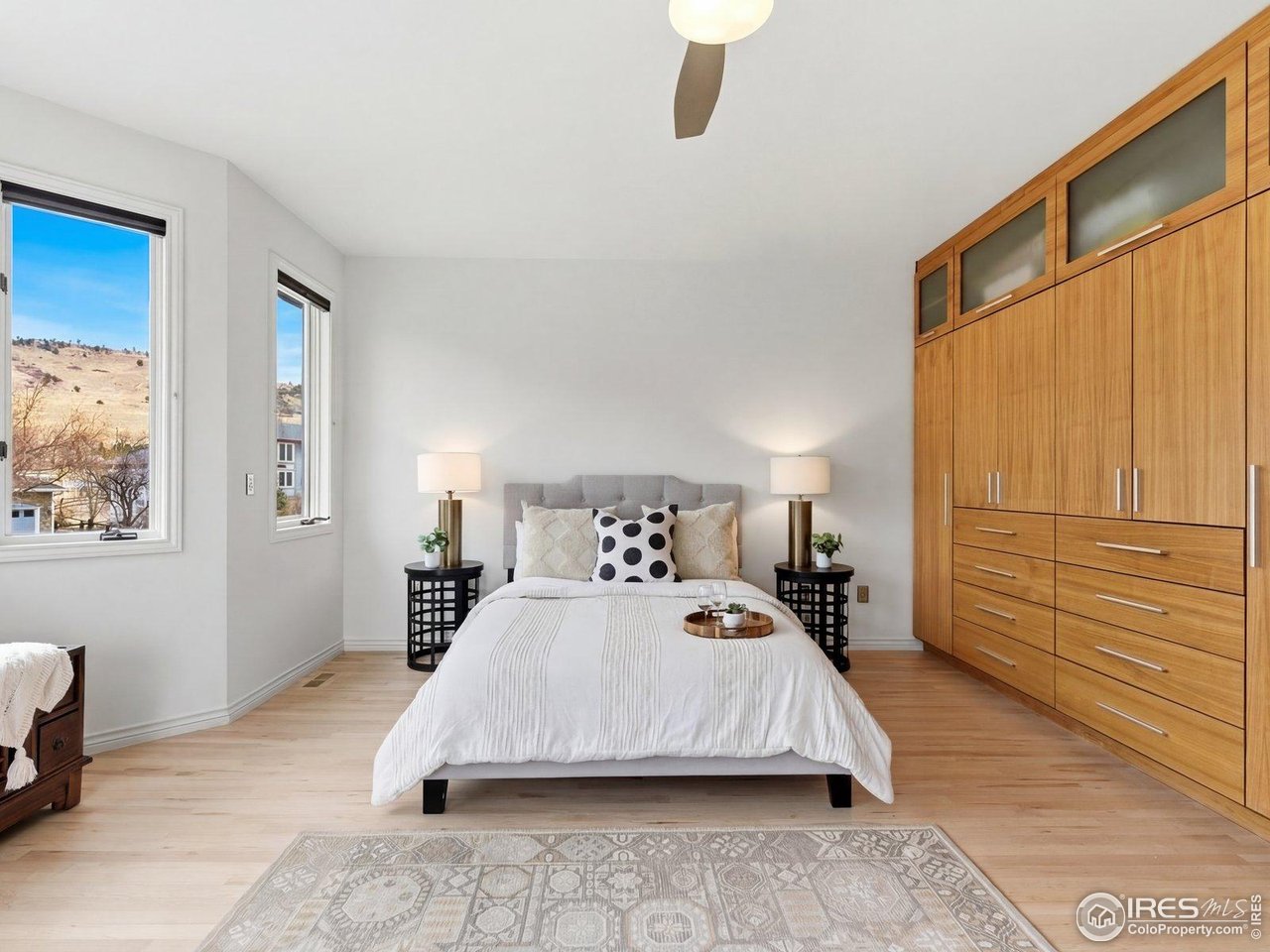 4796 6th Street Boulder, CO 80304 - Photo 24 of 47 a bedroom with a large bed and a window