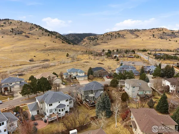 an aerial view of residential building and parking space