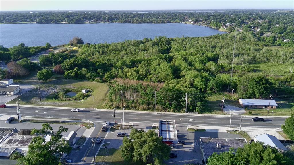 Dundee Road Winter Haven, FL 33884 - Photo 1 of 6 an aerial view of a house with yard